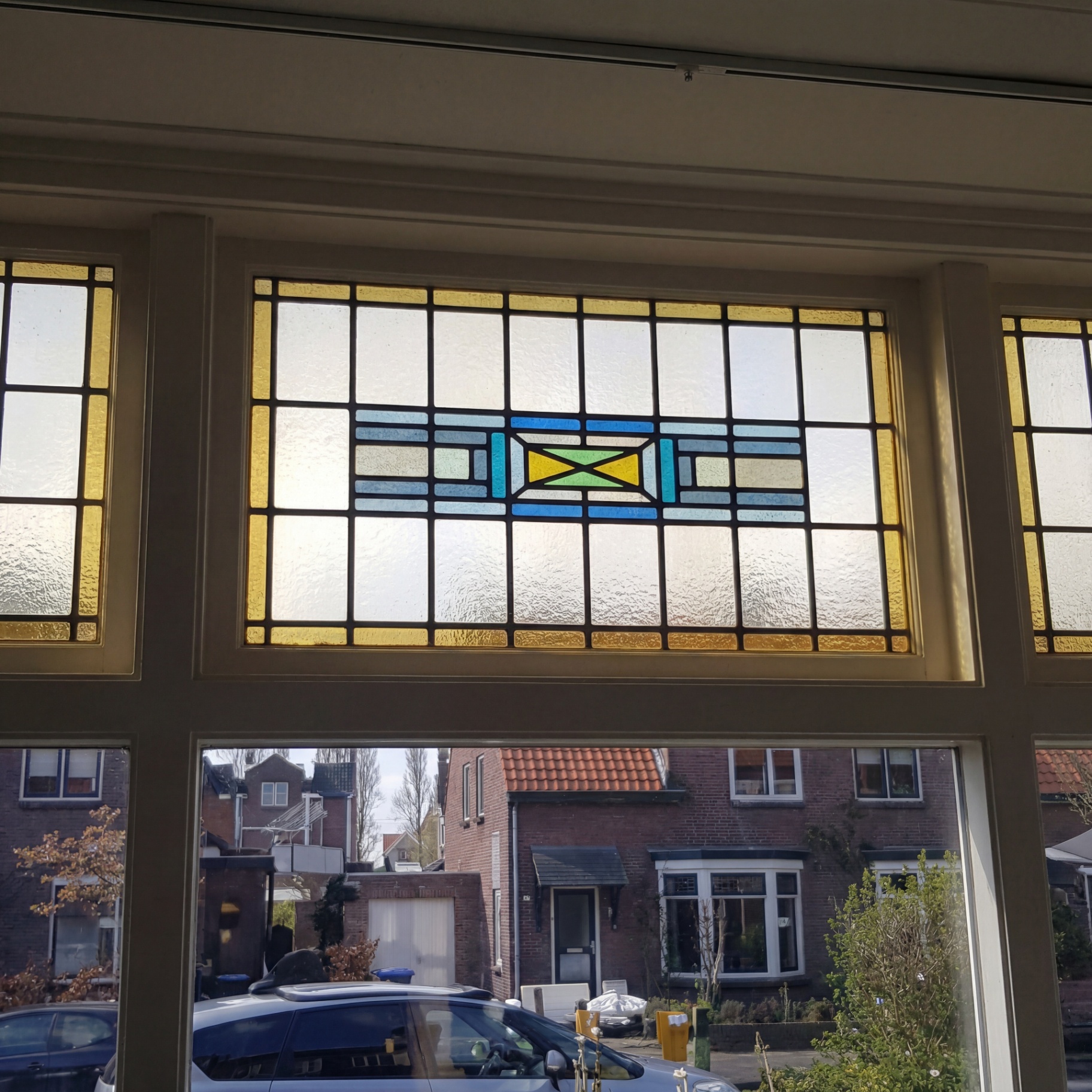 Glas-in-loodpanelen teruggeplaatst tussen dubbel glas